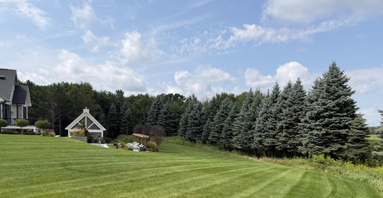 Manicured Estate Lawn with Fire Pit Lounge